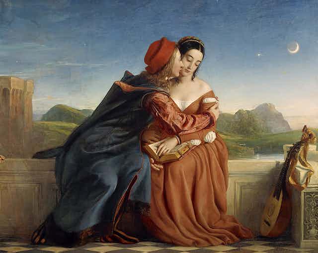 Paolo leans in to kiss the cheek of Francesca. He wears a red hat and she a red dress. The moon is rising in the sky behind them. Francesca da Rimini by William Dyce (1837), depicting Dante’s Francesca and Paolo. National Gallery of Scotland, CC BY-SA